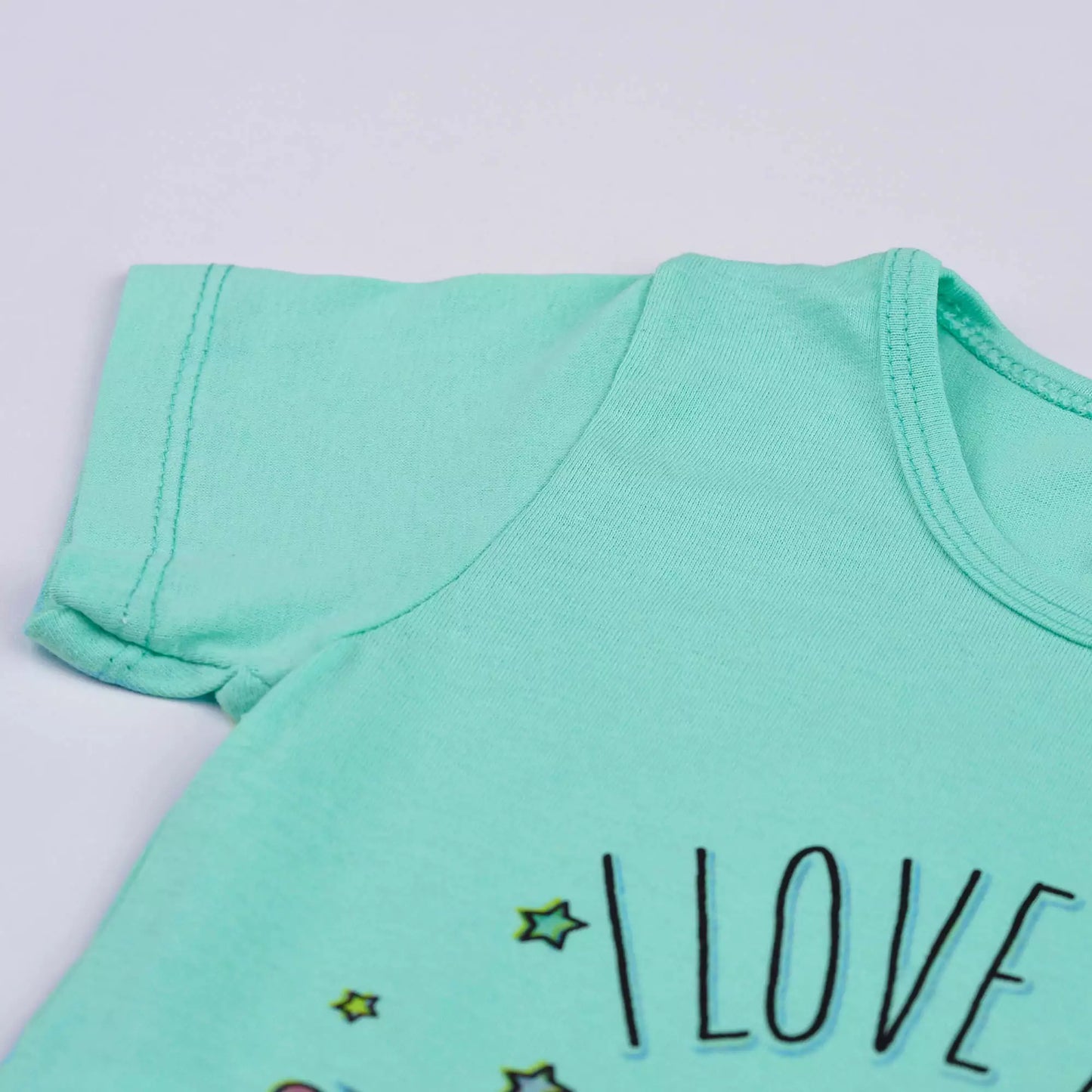 Pijama de Verão Infantil Feminino Blusa Verde Patins e Short Branco Estrela